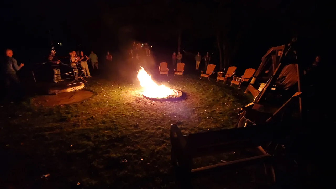 Riders gathered around a campfire